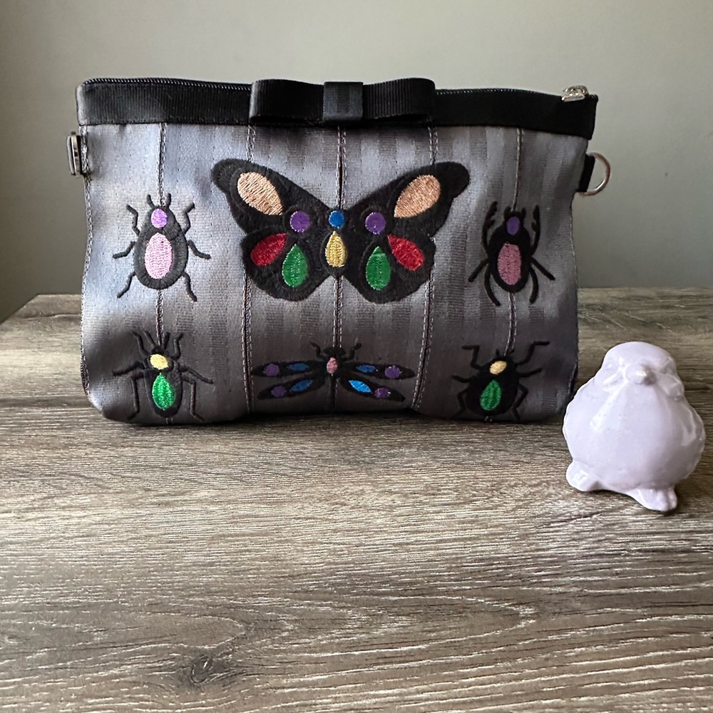 SOLD Harvey’s Bugsy bow clutch